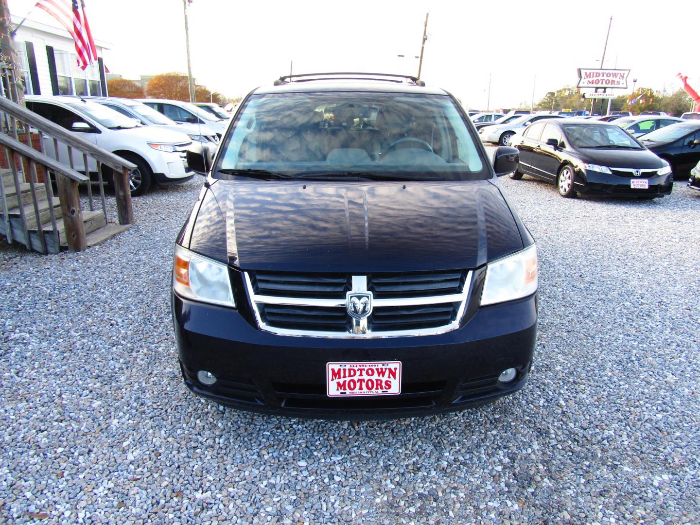 2010 Blue Dodge Grand Caravan SXT (2D4RN5DX9AR) with an 4.0L V6 SOHC 24V engine, Automatic transmission, located at 15016 S Hwy 231, Midland City, AL, 36350, (334) 983-3001, 31.306210, -85.495277 - Photo#1